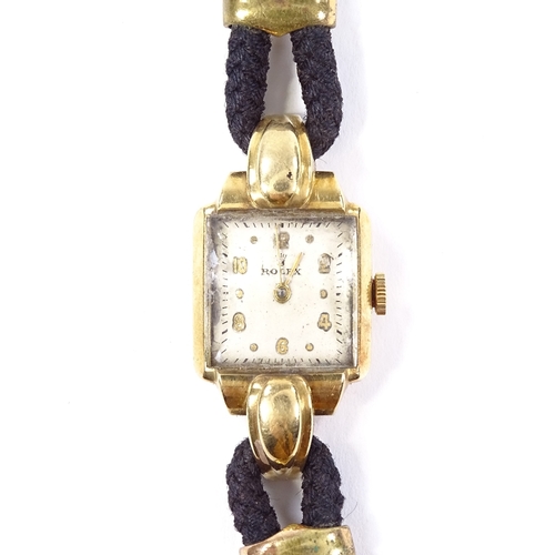 404 - ROLEX - a lady's 18ct gold Precision mechanical wristwatch, champagne dial with gilt Arabic and dot ... 