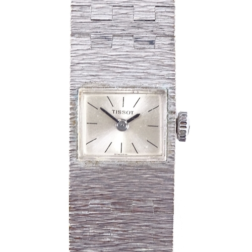 422 - TISSOT - a lady's stainless steel mechanical cocktail wristwatch, silvered dial with baton hour mark... 