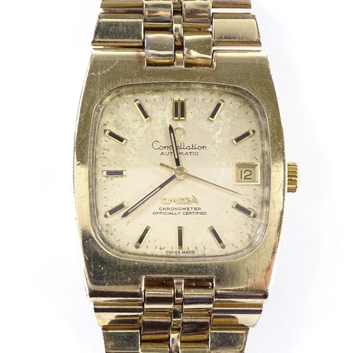 424 - OMEGA - a gold plated stainless steel Constellation automatic wristwatch, champagne dial with gilded... 