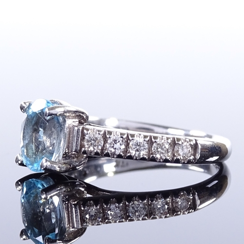 460 - An 14ct white gold aquamarine and diamond dress ring, total diamond content approx 0.4ct, setting he... 