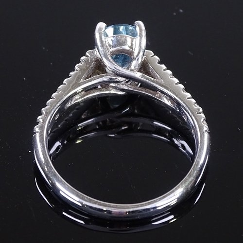 460 - An 14ct white gold aquamarine and diamond dress ring, total diamond content approx 0.4ct, setting he... 