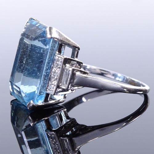 461 - An Art Deco style large aquamarine and diamond dress ring, with round and baguette-cut stepped diamo... 