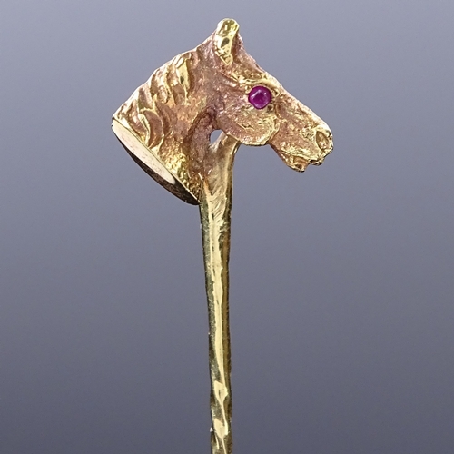 471 - A 9ct gold ruby figural horsehead stick pin, maker's marks C and F, hallmarks London 1977, overall l... 