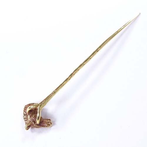 471 - A 9ct gold ruby figural horsehead stick pin, maker's marks C and F, hallmarks London 1977, overall l... 