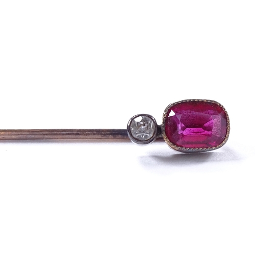 474 - An Austro-Hungarian high carat gold pink topaz and paste stick pin, dog head mark in between A and 4... 