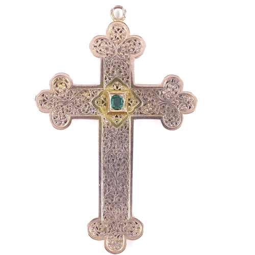 476 - A French? unmarked gold emerald crucifix pendant, pierced and engraved scrollwork decoration with ce... 