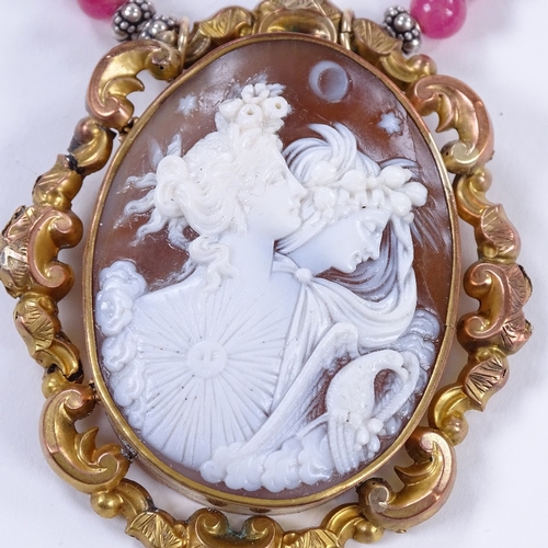 481 - A relief carved cameo shell panel and polished pink amethyst necklace, depicting female busts, in pi... 