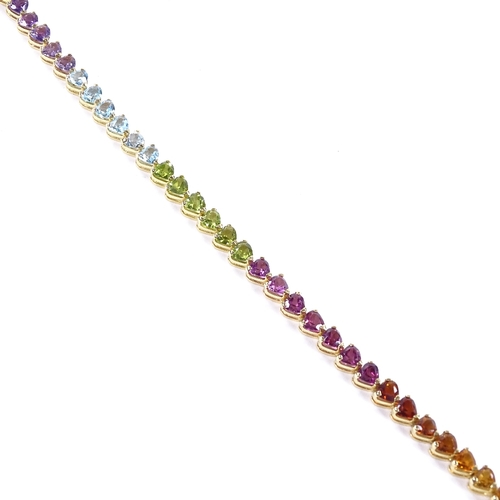 482 - An 18ct gold heart-cut multi-gem line bracelet, including amethyst, topaz, peridot and citrines, bra... 