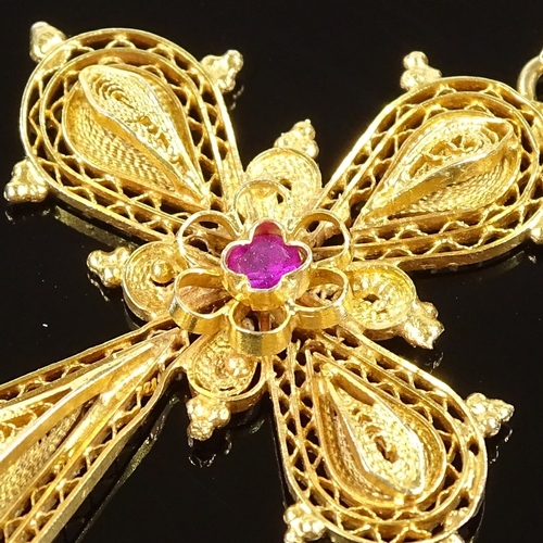 485 - An 18ct gold filigree ruby crucifix/cross pendant, height excluding bale 44.3mm, 5.3g