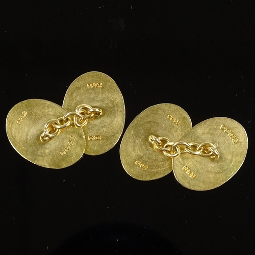 488 - A pair of 18ct gold oval panel cufflinks, engine turned decoration, maker's marks PP Ltd, hallmarks ... 