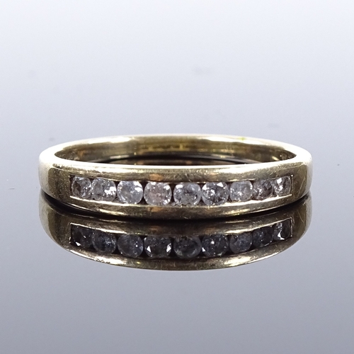 490 - A 9ct gold diamond half eternity ring, total channel set diamond content approx 0.25ct, setting heig... 