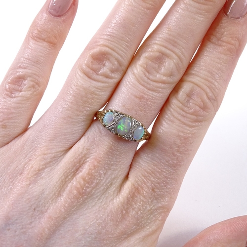 491 - A 9ct gold 7-stone opal and diamond half-hoop ring, scroll engraved bridge and shoulders, setting he... 