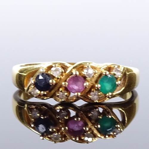 494 - An unmarked gold emerald ruby sapphire and paste dress ring, pierced settings and shoulders, setting... 