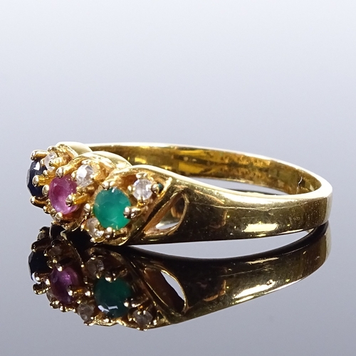 494 - An unmarked gold emerald ruby sapphire and paste dress ring, pierced settings and shoulders, setting... 