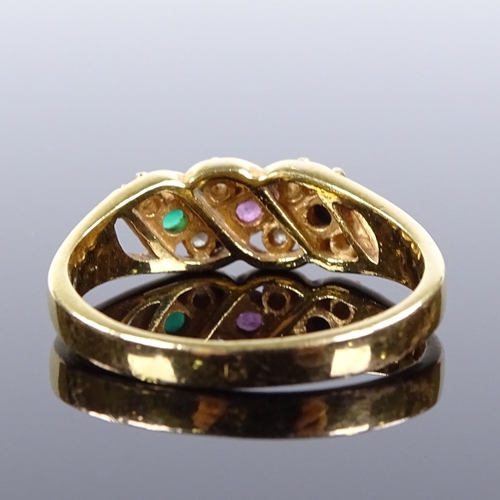 494 - An unmarked gold emerald ruby sapphire and paste dress ring, pierced settings and shoulders, setting... 