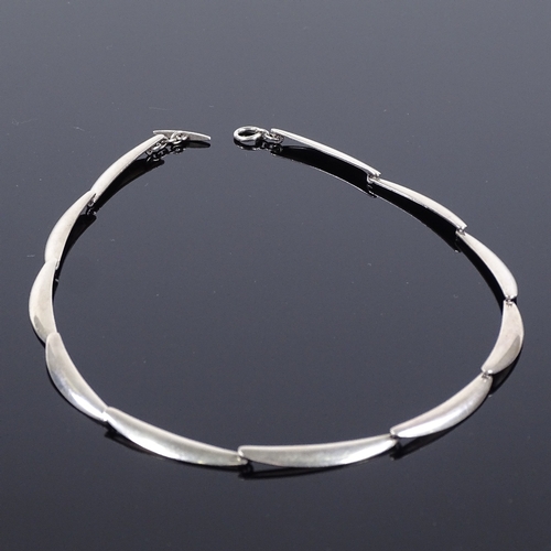 503 - A Theodor Skat-Rorden Danish sterling silver necklace, eleven plain curved form panels, maker's mark... 