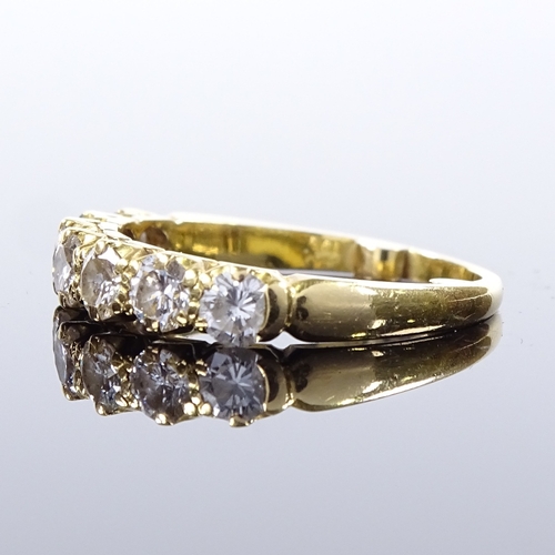 507 - An unmarked gold 7-stone diamond half hoop ring, total diamond content approx 1.4ct, each diamond ap... 