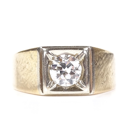 496 - A 14ct gold 0.85ct solitaire diamond gypsy ring, setting height 9.6mm, size S, 6.4g