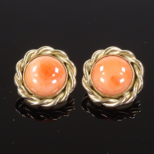 508 - A pair of 9ct gold cabochon coral earrings, with clip fittings and rope twist surround, earring diam... 