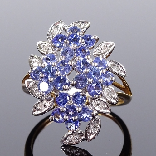 515 - A 9ct gold blue stone and diamond cluster cocktail ring, with openwork bridge, setting height 22.3mm... 