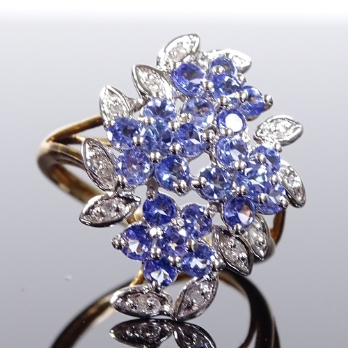 515 - A 9ct gold blue stone and diamond cluster cocktail ring, with openwork bridge, setting height 22.3mm... 