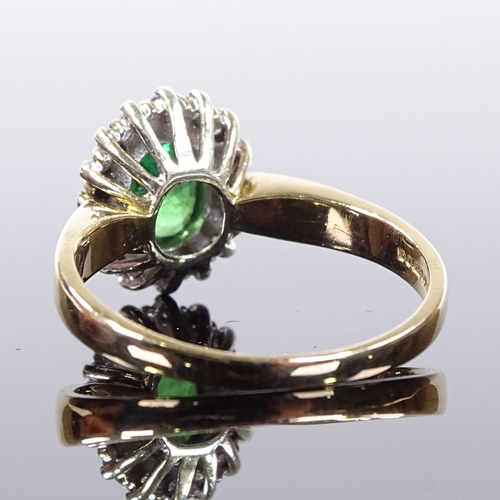 517 - A 9ct gold emerald and diamond cluster ring, diamond set shoulders, maker's marks DS & Co, hallmarks... 