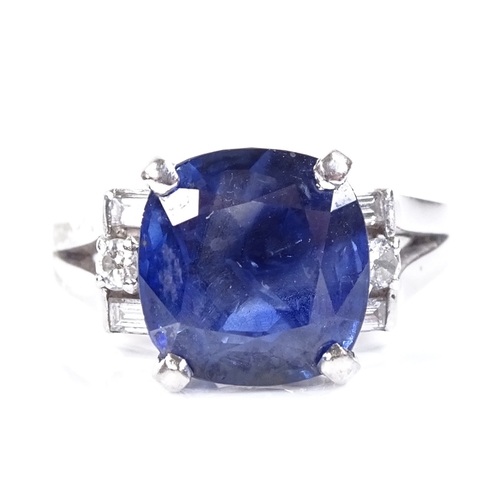 518 - A platinum sapphire and diamond dress ring, set with cushion-cut sapphire and baguette and round-cut... 