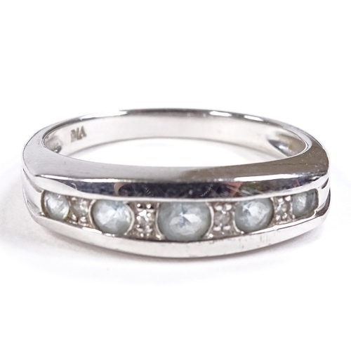 522 - A 9ct white gold 9-stone blue topaz and diamond half-hoop ring, setting height 5mm, size L, 2.7g