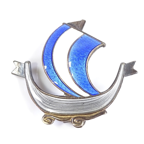 524 - An Aksel Holmsen Norwegian sterling silver gilt and coloured enamel viking ship brooch, height 30.8m... 