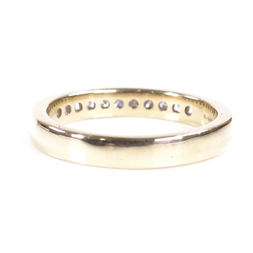 528 - A 9ct gold diamond half eternity ring, total diamond content approx 0.25ct, setting height 3.2mm, si... 