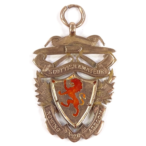 529 - A 9ct rose gold Scottish Amateur Rowing Association medal, with enamelled rampant lion, dated 1920, ... 