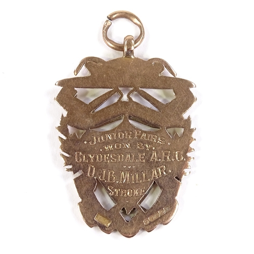 529 - A 9ct rose gold Scottish Amateur Rowing Association medal, with enamelled rampant lion, dated 1920, ... 