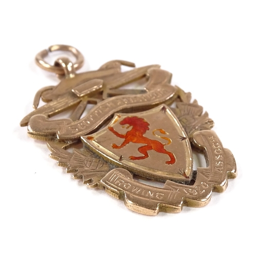 529 - A 9ct rose gold Scottish Amateur Rowing Association medal, with enamelled rampant lion, dated 1920, ... 