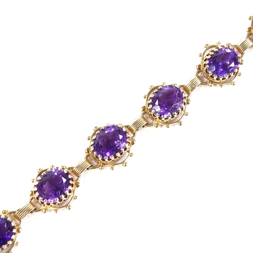 532 - A 14ct gold amethyst bracelet, pierced panel settings, bracelet length 17.5cm, 16.7g