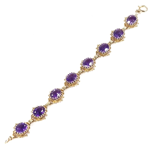 532 - A 14ct gold amethyst bracelet, pierced panel settings, bracelet length 17.5cm, 16.7g