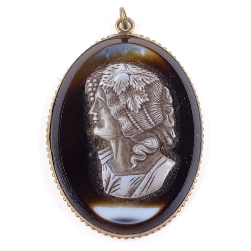 537 - A relief carved cameo agate panel pendant, depicting female bust, in gilt-metal frame, pendant heigh... 