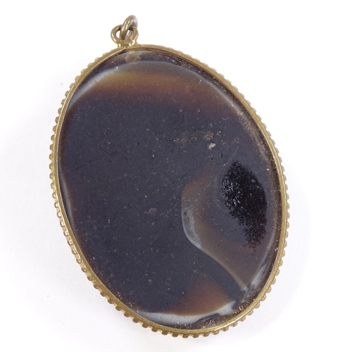 537 - A relief carved cameo agate panel pendant, depicting female bust, in gilt-metal frame, pendant heigh... 