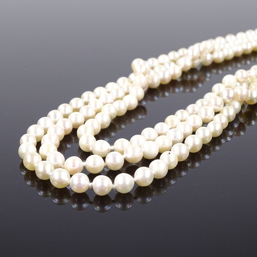 541 - A triple strand cultured pearl collar necklace, on 9ct foliate engraved clasp, necklace length 13