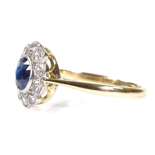 555 - An 18ct gold sapphire and diamond cluster flowerhead ring, setting height 10.8mm, size N, 2.7g