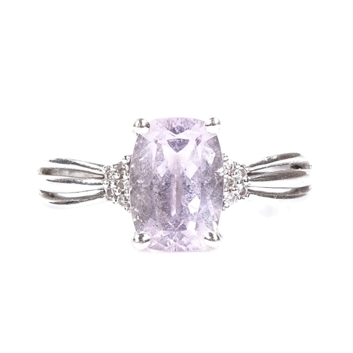 561 - An 18ct white gold pale pink amethyst and diamond dress ring, setting height 10.2mm, size T, 5.2g