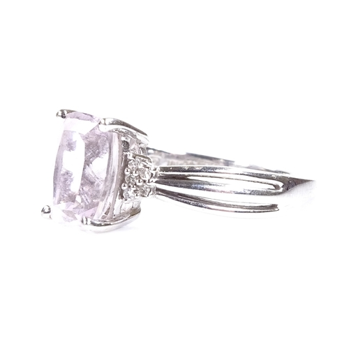 561 - An 18ct white gold pale pink amethyst and diamond dress ring, setting height 10.2mm, size T, 5.2g