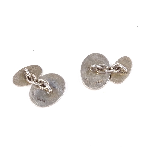 566 - A pair of silver oval cufflinks, by Mappin & Webb Ltd, hallmarks London 1978, panel length 18.5mm, 1... 