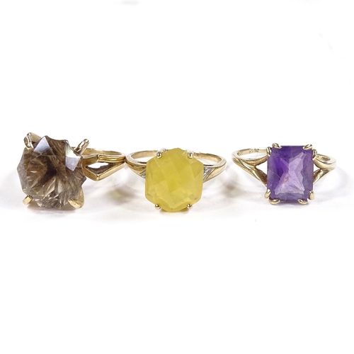 569 - 3 9ct gold stone set rings, comprising fire opal, smoky quartz and amethyst, 12.8g total (3)