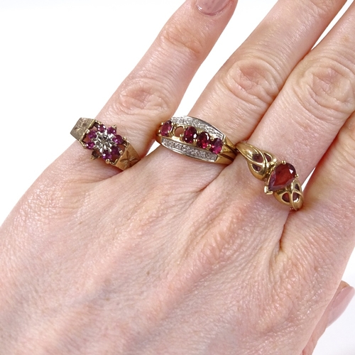 572 - 3 9ct gold stone set rings, including garnet, 8.7g total (3)