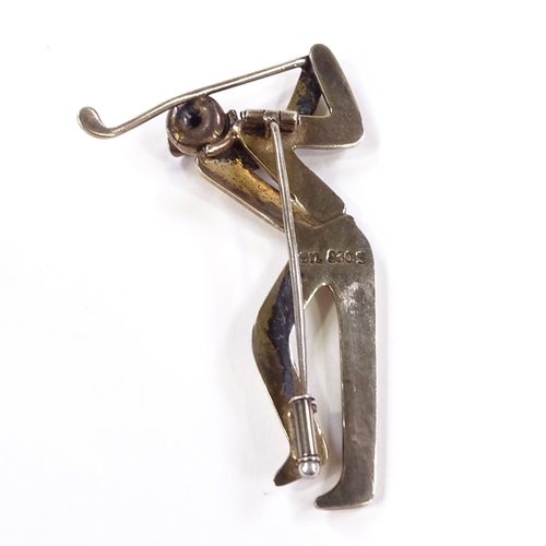 573 - An Evald Nielsen Danish silver figural golfer brooch, stylised form, maker's marks En, 830 S standar... 