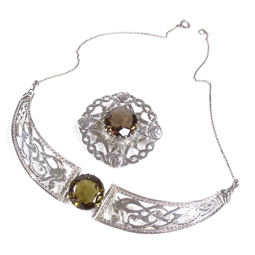 585 - A Scottish silver smoky quartz necklace and brooch, with pierced settings, hallmarks Edinburgh 1975,... 