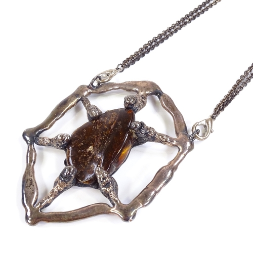 587 - A Vintage 1960s brutalist oversized silver plated amber pendant necklace, double plated chain with r... 