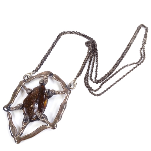 587 - A Vintage 1960s brutalist oversized silver plated amber pendant necklace, double plated chain with r... 