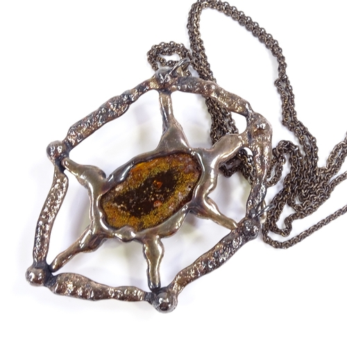 587 - A Vintage 1960s brutalist oversized silver plated amber pendant necklace, double plated chain with r... 