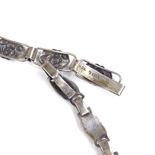 588 - A Henry Roland Danish silver floral panel bracelet, maker's marks H.Ro, 830 S standard, bracelet len... 